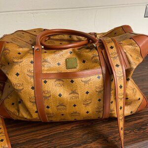 Authentic MCM Monogram Leather large suitcase traveler on wheels